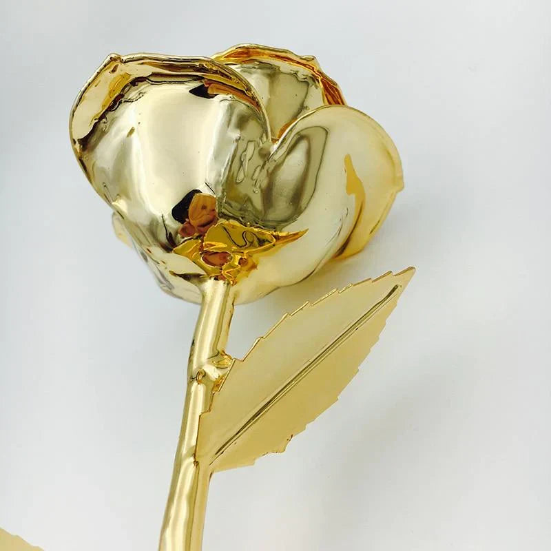 24K gold-dipped real rose, preserved with elegant stand & gift box.  Perfect gift for anniversaries, weddings, or birthdays.