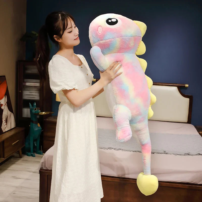 the rainbow dinosaur stuffed animal With a belly full of fluff