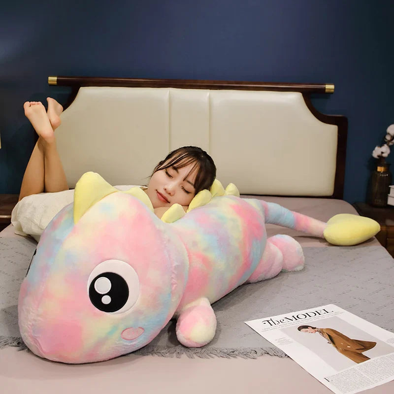 the rainbow dinosaur stuffed animal With a belly full of fluff