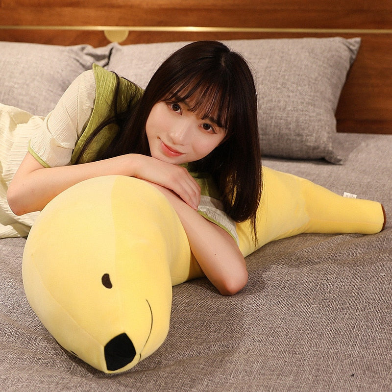 Cute yellow banana seal plush toy, made of soft PP cotton, perfect for snuggling.  Hypoallergenic & ethically sourced.
