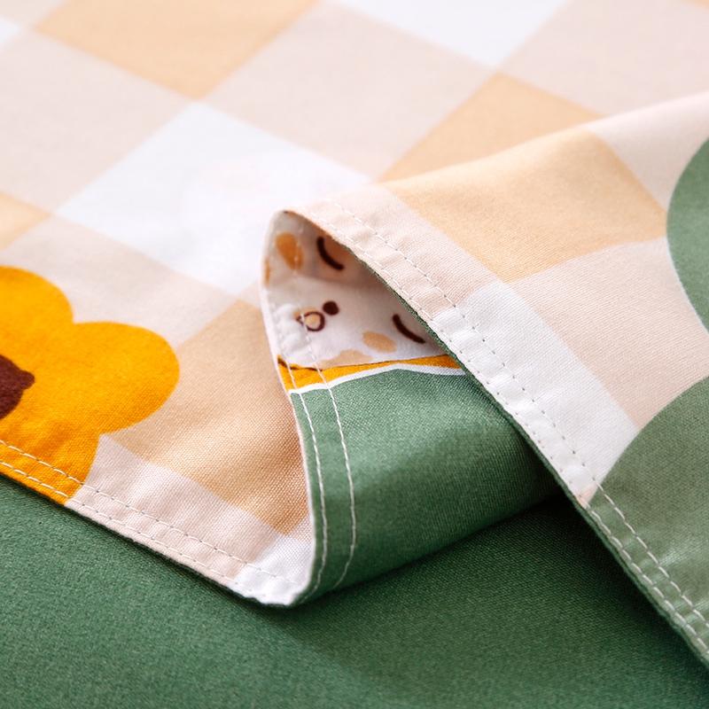 Reversible pastel green & beige bear & flower bedding set. Soft microfiber, machine washable. Includes duvet cover, sheet, pillowcases.