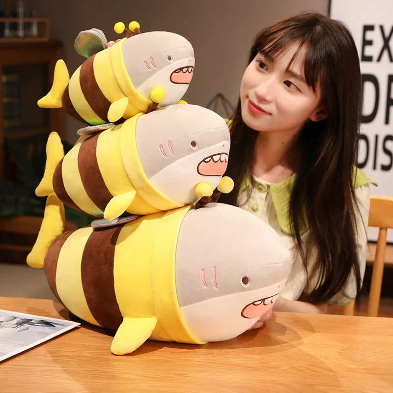 Cute bee shark plush toy, soft PP cotton filling, yellow and brown striped design, glittery wings.  Adorable!