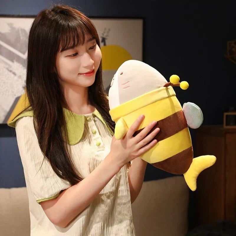Cute plush bee shark toy with glittery wings, soft plush material, and PP cotton filling. Adorable design, perfect for snuggling.