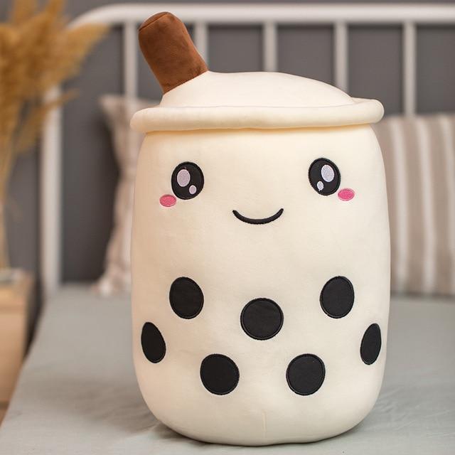 Cute beige bubble tea plush toy with brown straw, black boba, and happy face. Soft PP cotton.