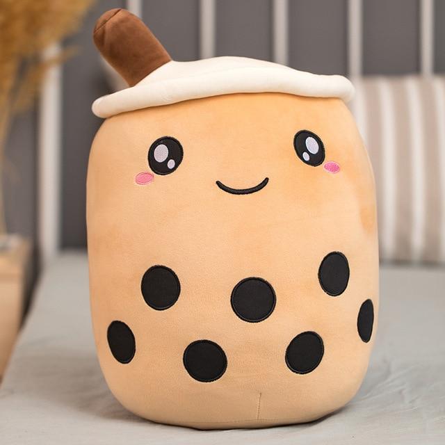 Cute beige bubble tea plush toy with brown straw, black boba, and happy face. Soft PP cotton filling.