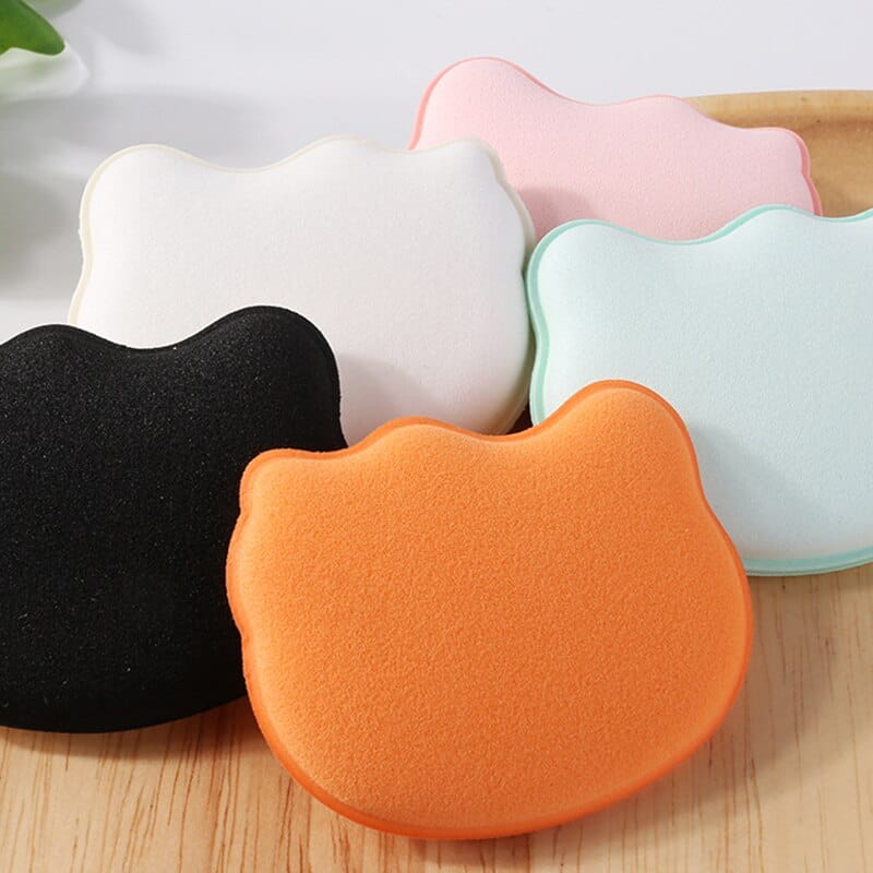 Soft hydrophilic polyurethane makeup blender sponge; cute cat shape; black color; blends makeup flawlessly.
