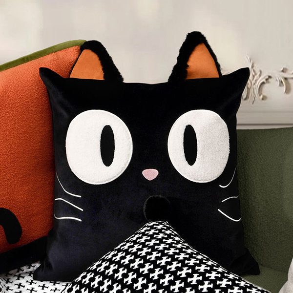 Cute black cat plush pillow, 17.7", soft Berber fleece, large white eyes, orange ears.