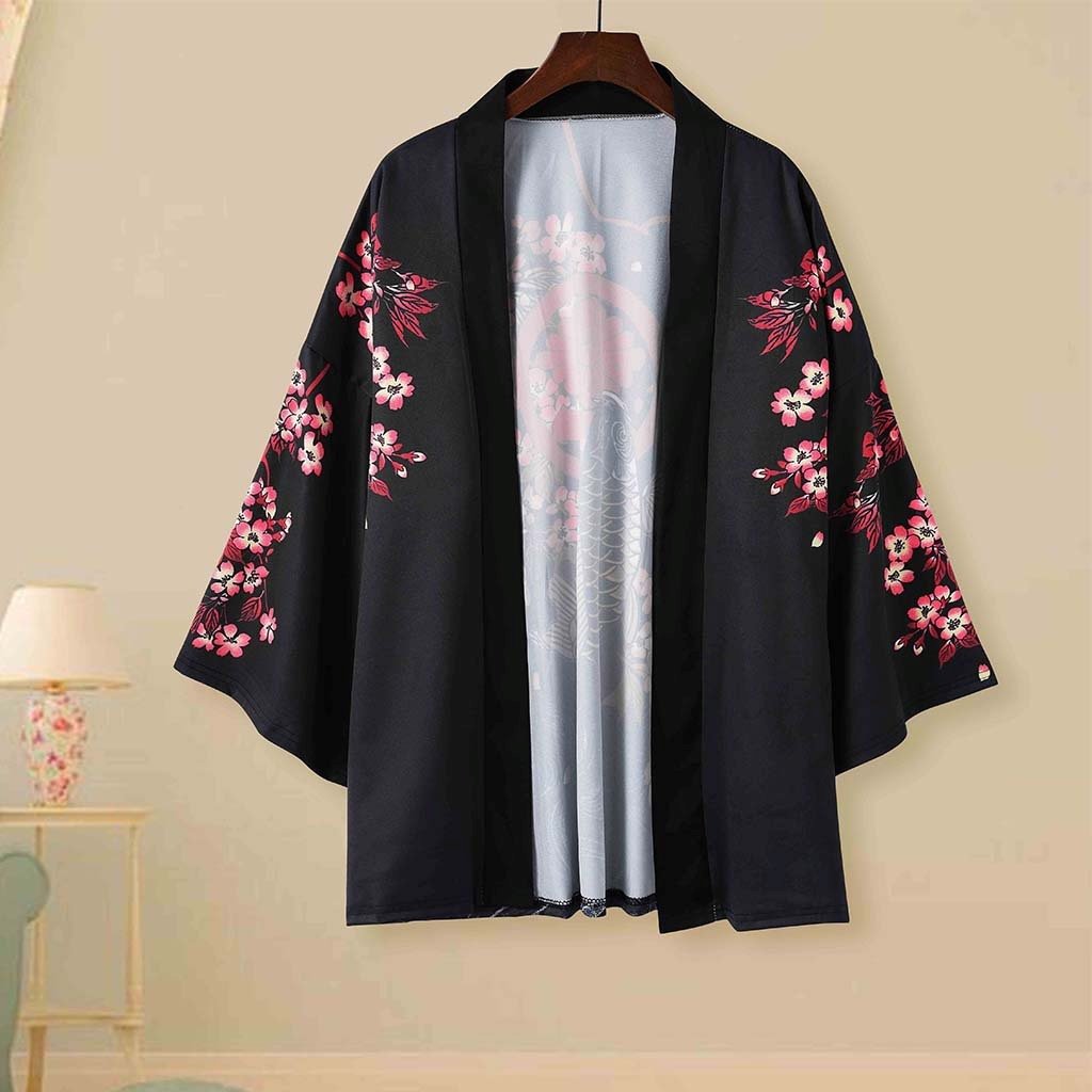 Black unisex kimono featuring a koi fish and cherry blossom print, made from soft polyester.  Available in sizes M-XXL.