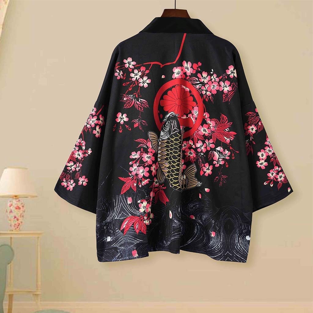 Black unisex kimono featuring koi fish, cherry blossoms, and Kanagawa waves.  Made of soft polyester, available in sizes M-XXL.