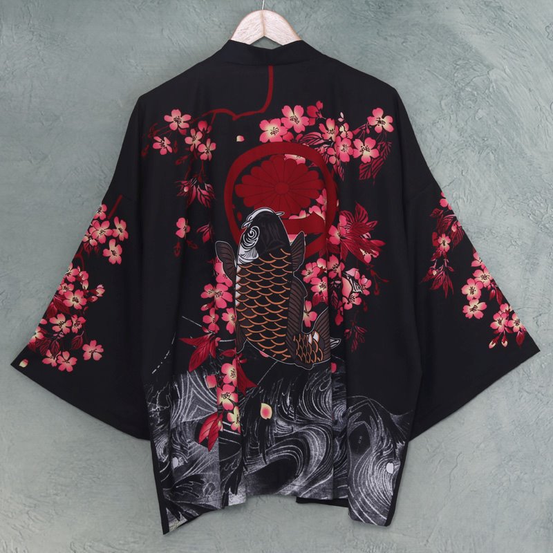 Black unisex kimono featuring a koi fish, cherry blossoms, and Kanagawa waves design. Made of soft polyester. Sizes M-XXL.