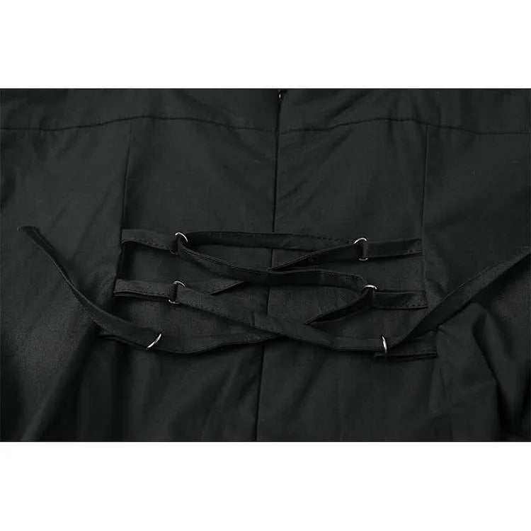 Black polyester midi dress with asymmetrical hem and lace-up back detail.