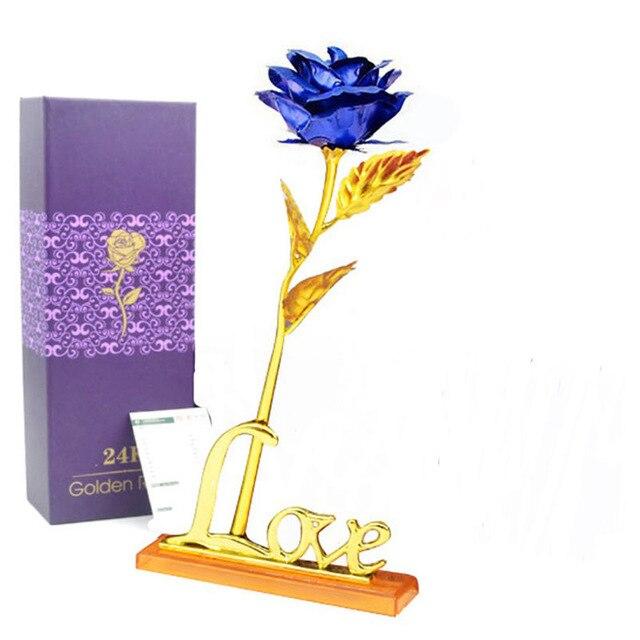 Blue iridescent galaxy rose with 24k gold plating, "Love" stand, and gift box.  Perfect gift for anniversaries.