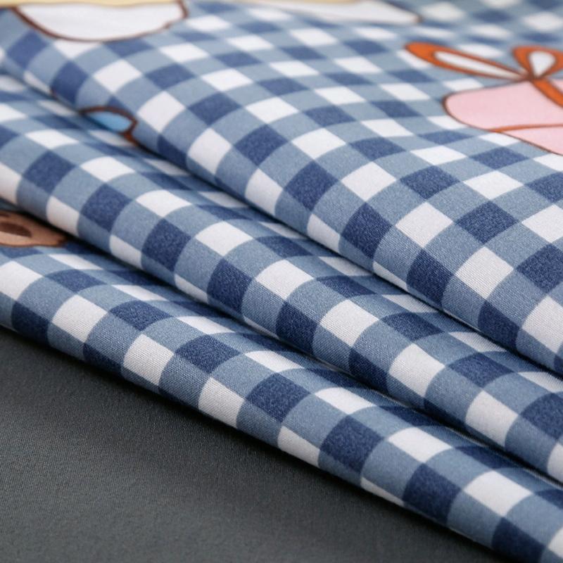 Blue gingham bedding set with cute bear print, soft microfiber, reversible design, zipper closure.