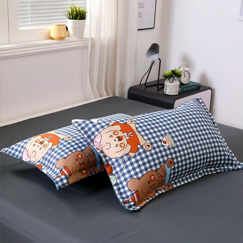 Blue gingham bedding set with cute bear illustrations. Reversible, soft polyester microfiber. Includes duvet cover, sheet, pillowcases.
