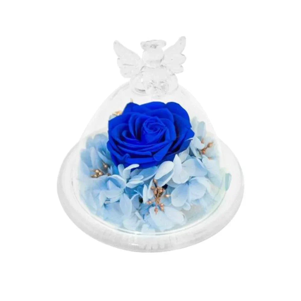 Blue preserved rose in glass dome with angel wings, nestled on baby blue hydrangeas.  Long-lasting, elegant décor.