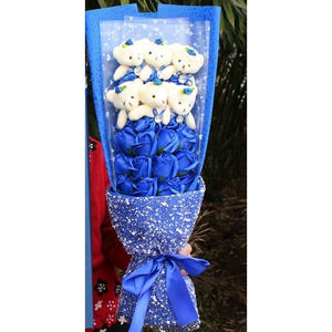 Adorable blue rose teddy bear bouquet; perfect gift for any occasion. Features soft plush bears & artificial roses.  Long-lasting & unique.