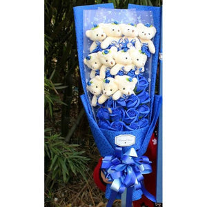 Blue rose teddy bear bouquet; unique gift for birthdays, anniversaries, or Valentine's Day.  Soft plush bears nestled in artificial roses.  Long-lasting alternative to real flowers.