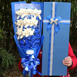 Adorable blue rose teddy bear bouquet; unique gift for birthdays, anniversaries & more.  Plush bears nestled in artificial roses.
