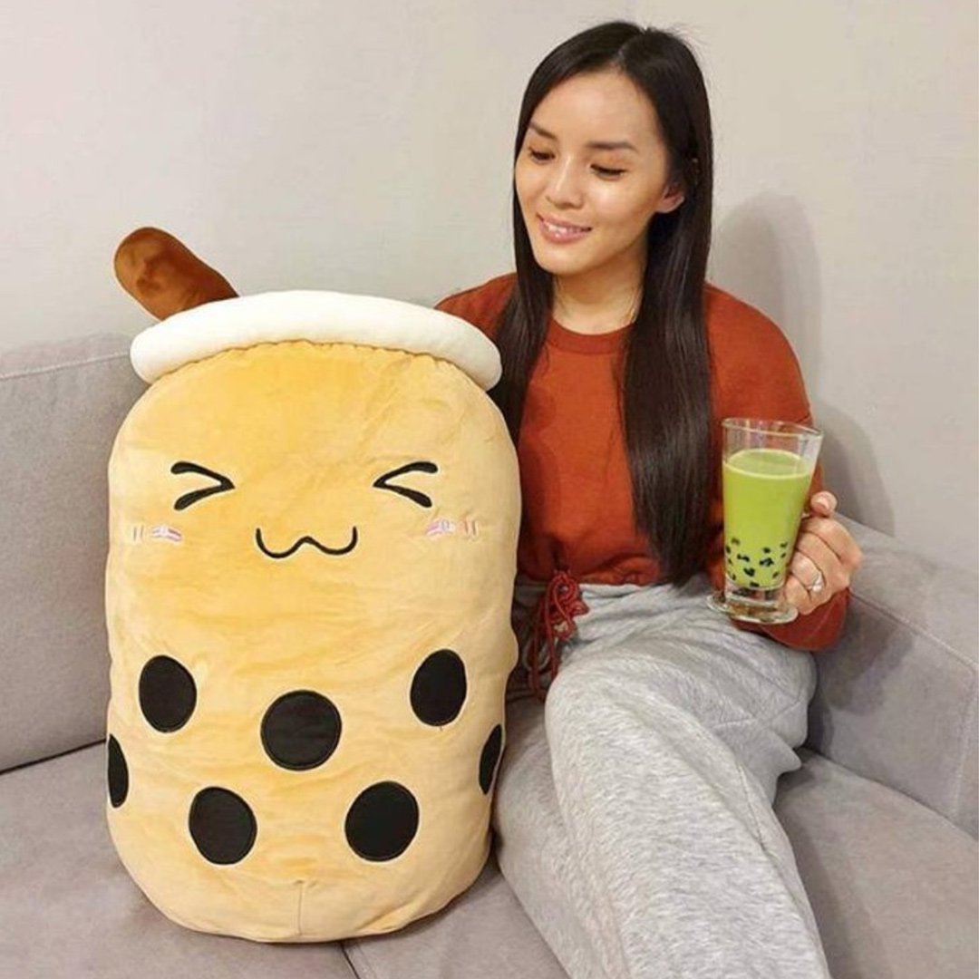 Cute beige bubble tea plush toy with brown straw, black boba, and happy face. Soft, cuddly, PP cotton filling.