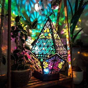 Color-changing bohemian projector lamp; diamond-shaped, wood & plastic, casts vibrant patterns. Perfect for relaxation, yoga, parties. USB powered.