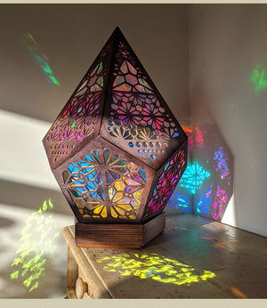Color-changing bohemian projector lamp; wood & plastic; casts rainbow patterns; USB powered; perfect for gifts, parties, or relaxation.