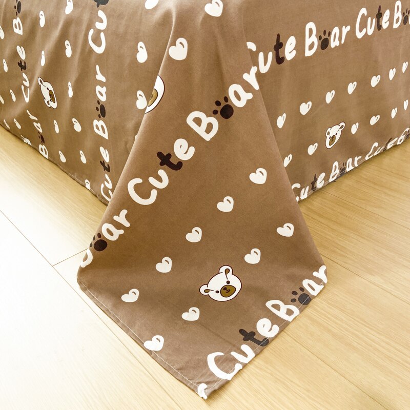 Brown kawaii bear bedding set, featuring cute bear prints, white hearts, and "Cute Bear" lettering. 100% polyester microfiber, includes duvet cover, flat sheet, and pillowcases.