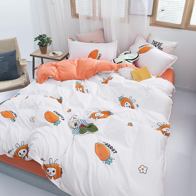 Kids' white and orange bunny carrot bedding set.  Soft polyester microfiber, reversible design, includes duvet cover, flat sheet, pillowcase(s).