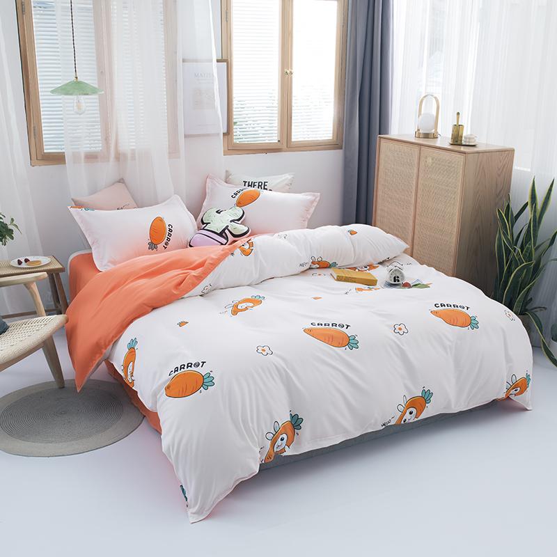 Kids' Bunny & Carrot bedding set; soft, breathable polyester microfiber; orange & white; reversible design; includes duvet cover, sheet, pillowcase(s).