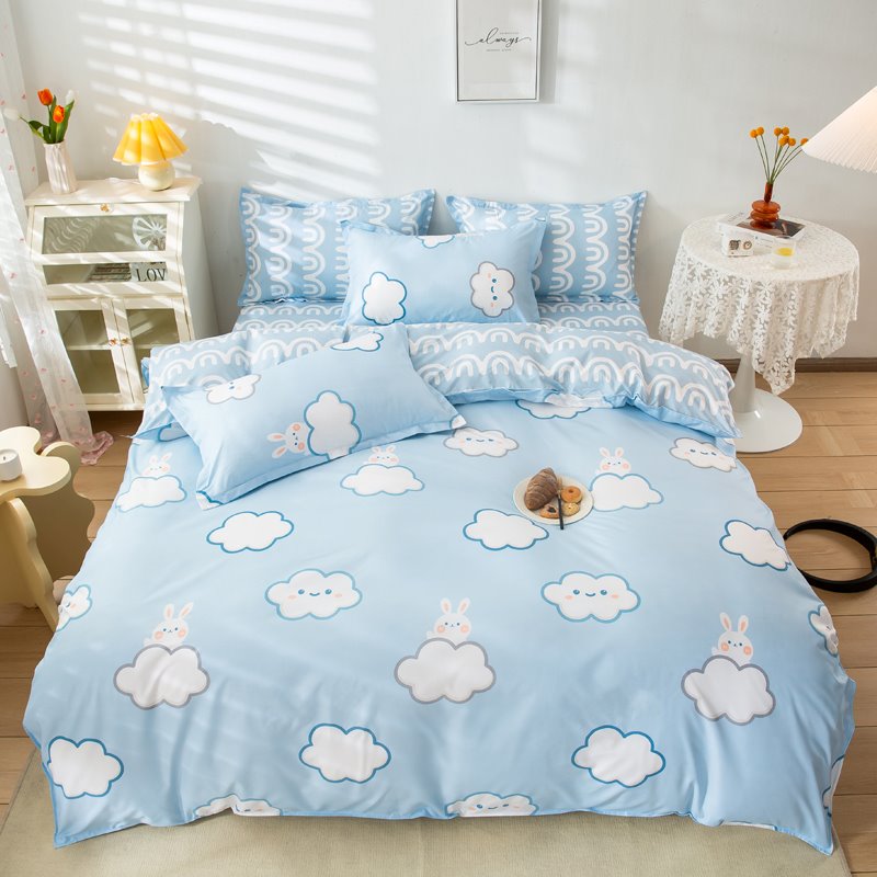 Baby blue kids bedding set with cute bunny and cloud print, ultra-soft polyester microfiber, reversible design, includes duvet cover, flat sheet, and pillowcases.