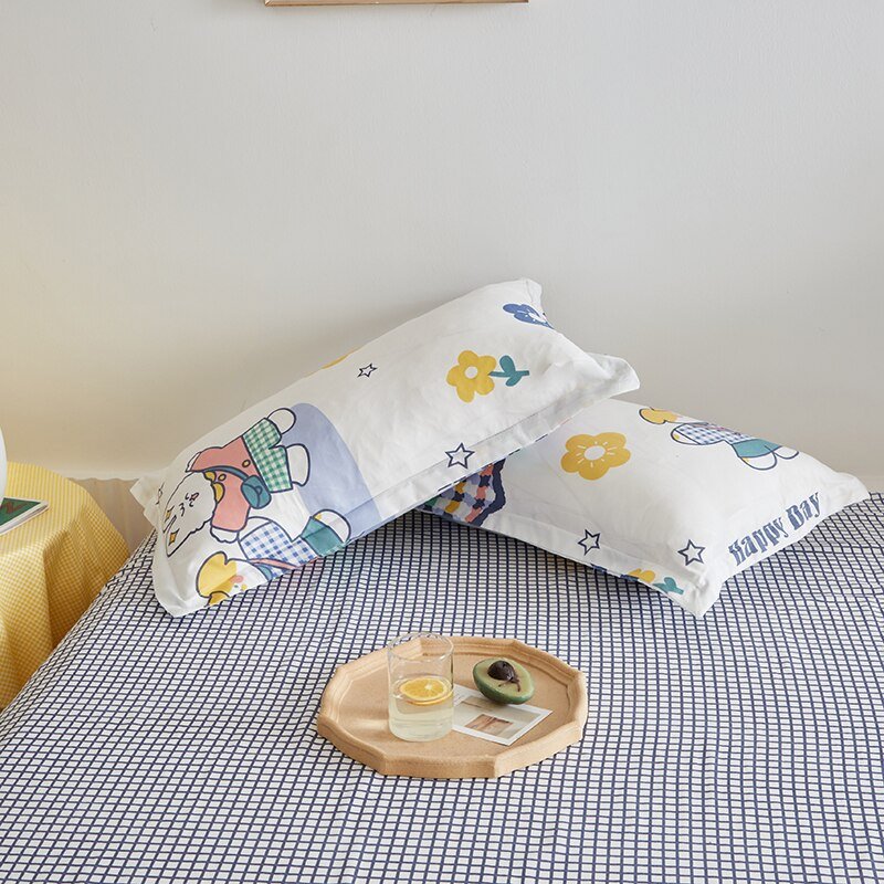 Cute bunny microfiber bedding set; reversible design, features adorable bunny and floral patterns, available in multiple sizes.