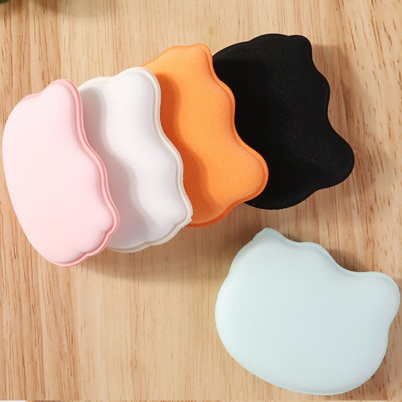 Five cute cat-shaped makeup blender sponges in black, orange, pink, white, and mint green; soft, hydrophilic polyurethane.