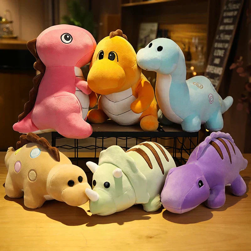 12 adorable chibi dinosaur plush toys in pink, orange, blue, green, purple & tan. Made of soft PP cotton, hypoallergenic, 3 sizes.