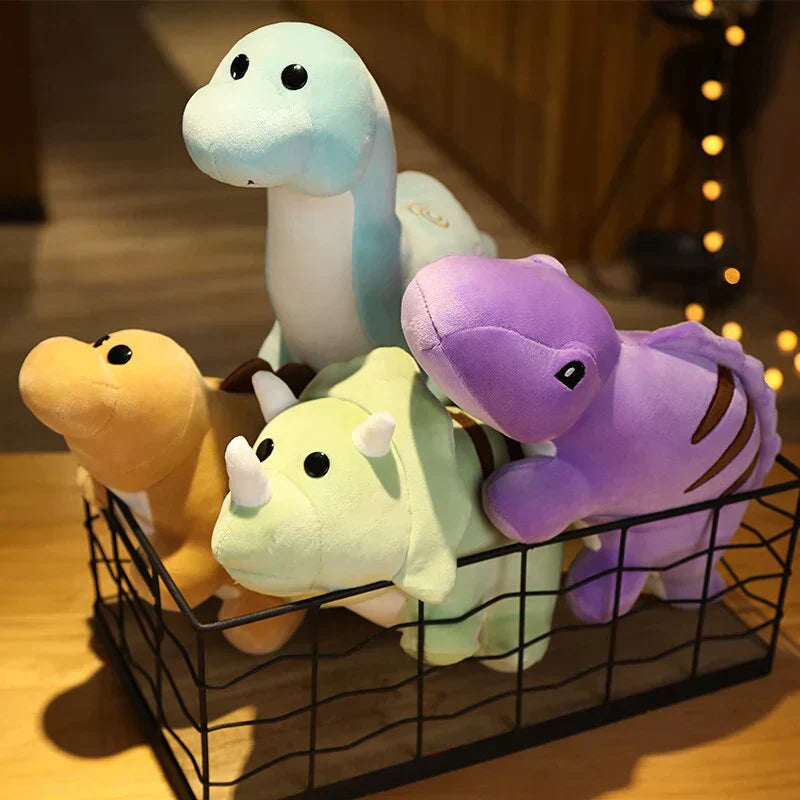 Four cute chibi dinosaur plush toys in assorted colors: light blue, purple, light green, and orange.  Made of soft PP cotton.