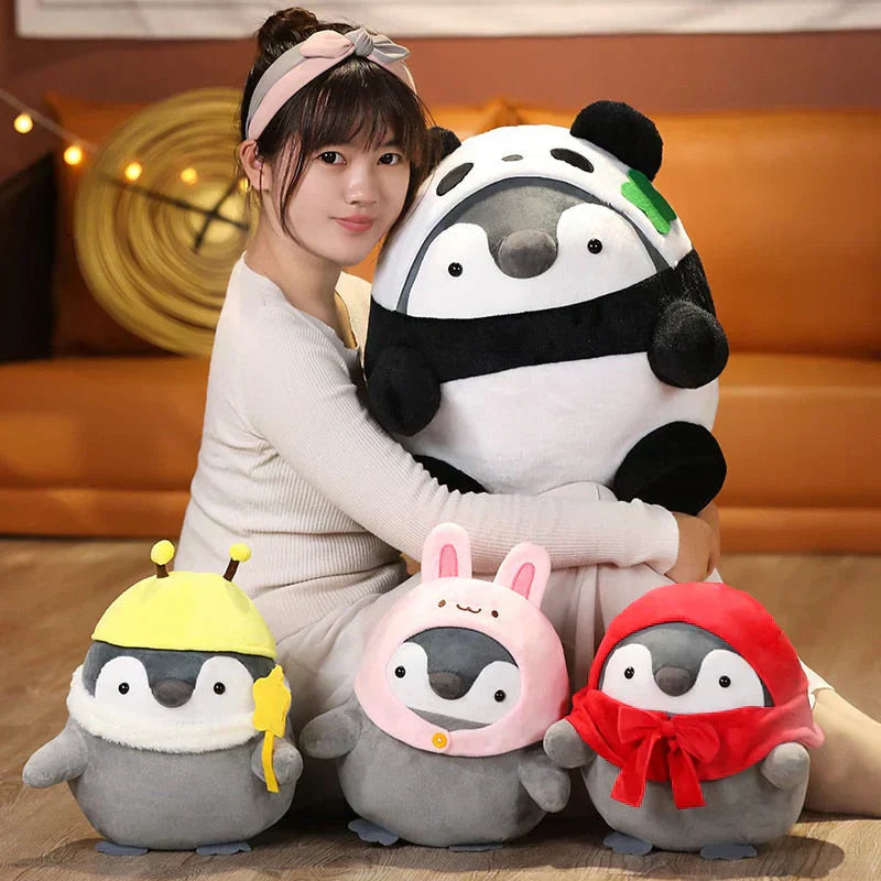 Adorable chubby penguin plush toys in panda, bunny, bee, and red hood costumes.  Soft PP cotton, hypoallergenic, 3 sizes.