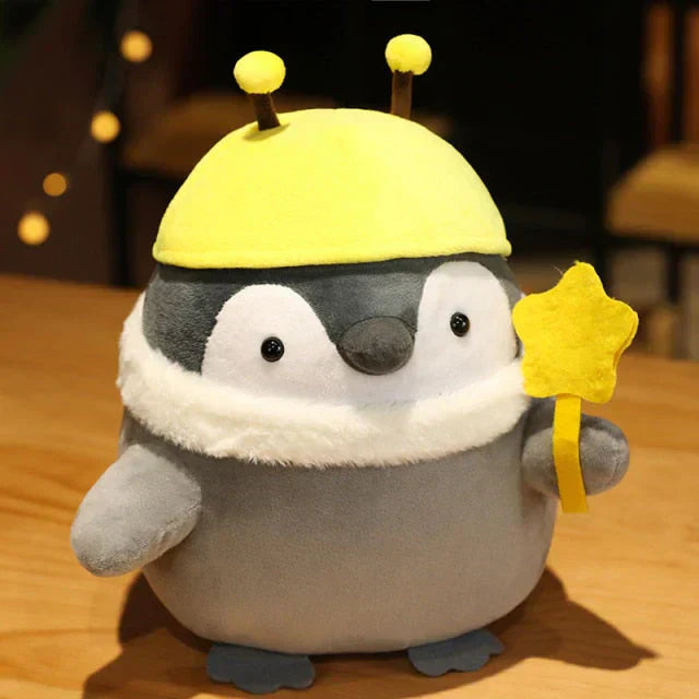 Adorable grey chubby penguin plush toy wearing a yellow bee hat, holding a star wand. Made of soft PP cotton, hypoallergenic.