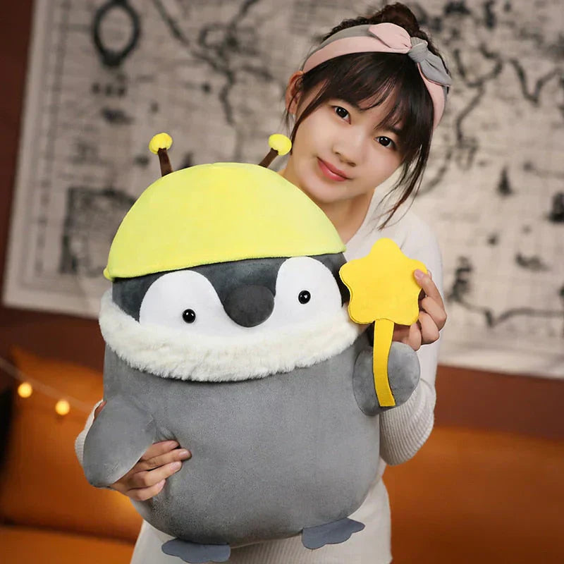 Adorable chubby gray penguin plush toy wearing a yellow hat, made with soft PP cotton, hypoallergenic, perfect for cuddling.