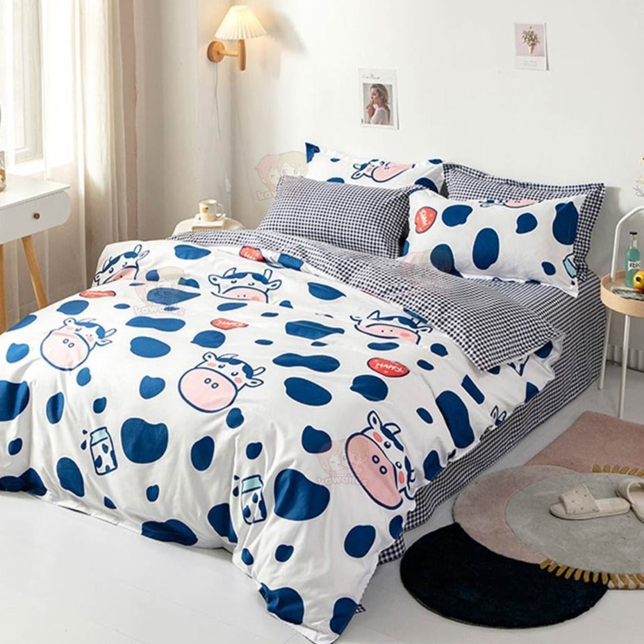 Cute cow and milk cartoon bedding set; reversible, 100% polyester microfiber; includes duvet cover, flat sheet, and pillowcases.