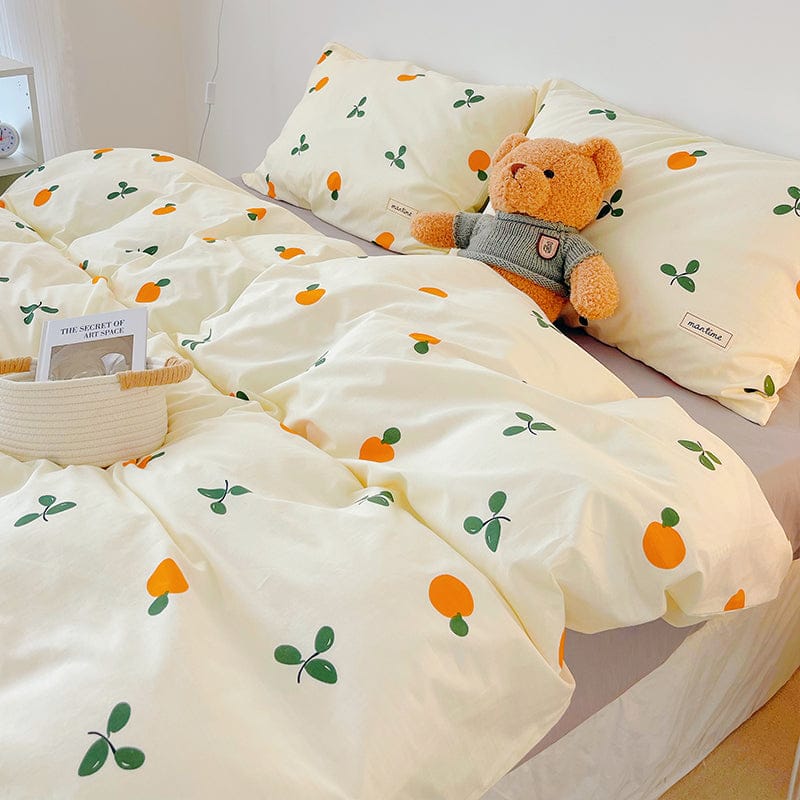 Cream cotton bedding set with cute orange and leaf pattern.  Includes duvet cover, flat sheet, and pillowcases. Available in Twin, Full, & Queen.