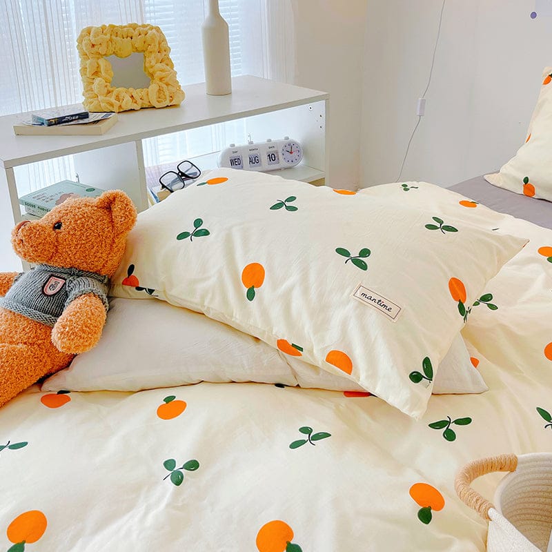Cream cotton bedding set with cute orange & leaf pattern, available in Twin, Full & Queen sizes; includes duvet cover, flat/fitted sheet(s), & pillowcase(s).