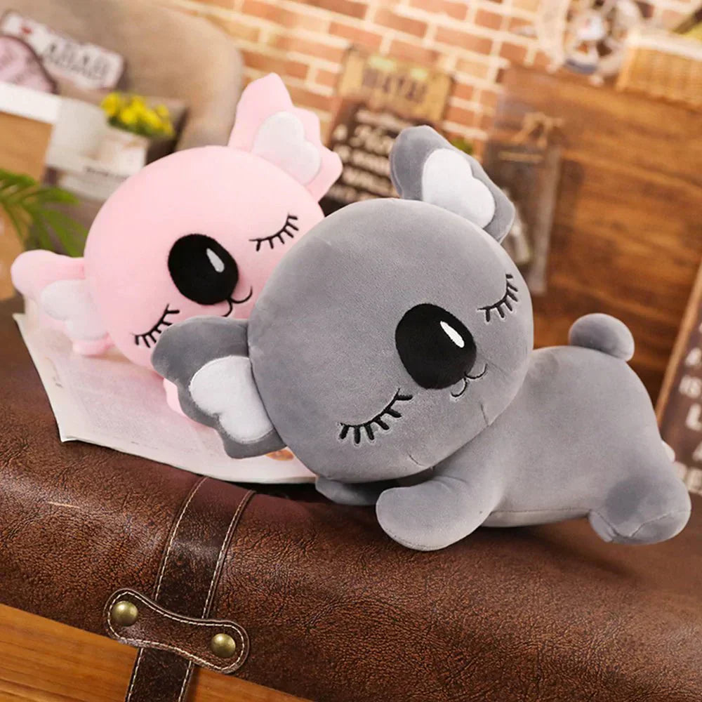 Adorable gray and pink koala plush toys, made of soft PP cotton, perfect for cuddling and relaxation.
