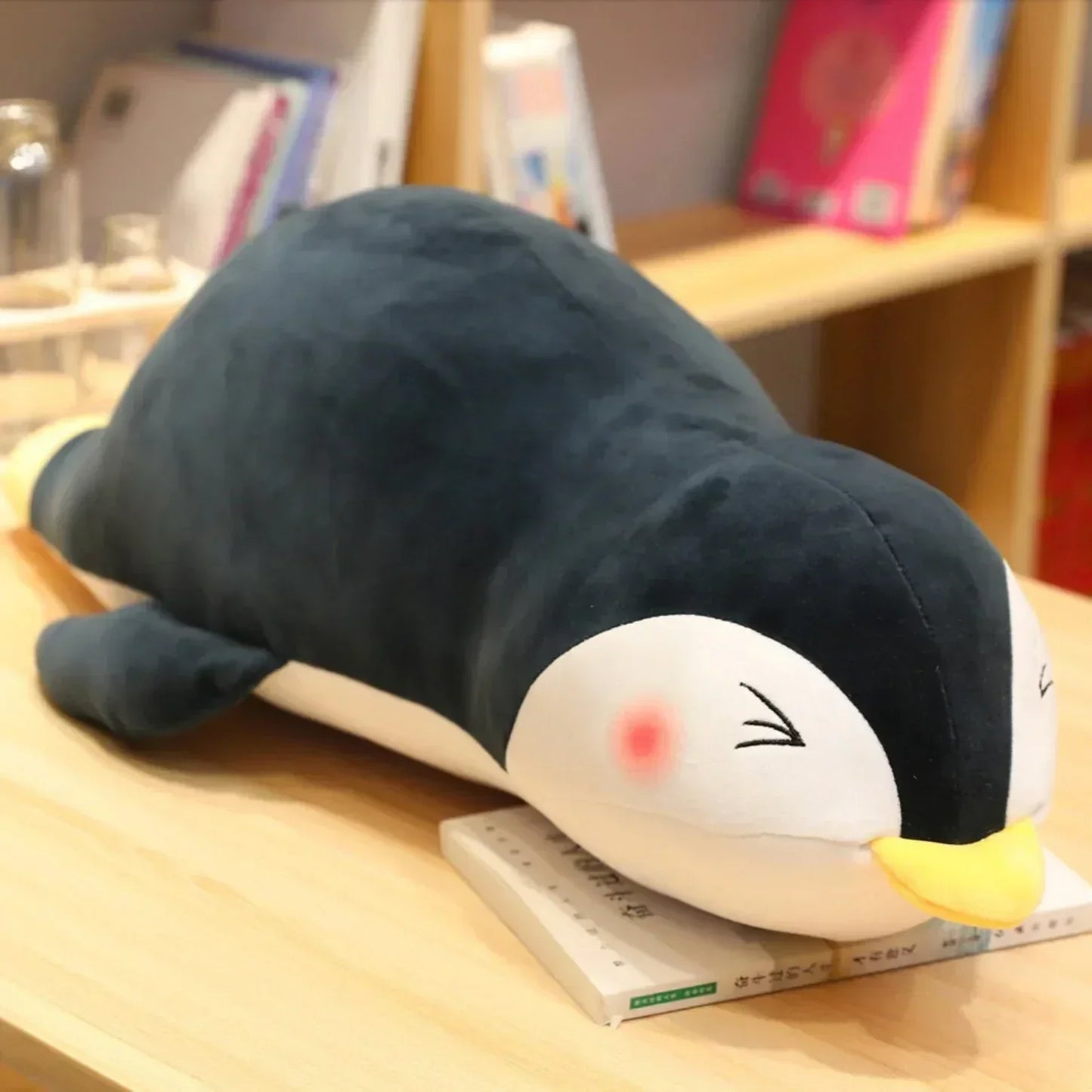 Adorable dark-gray penguin plush pillow, made of soft PP cotton, perfect for snuggling.  Multiple sizes available.