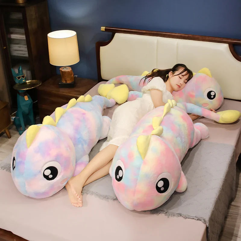 the rainbow dinosaur stuffed animal With a belly full of fluff