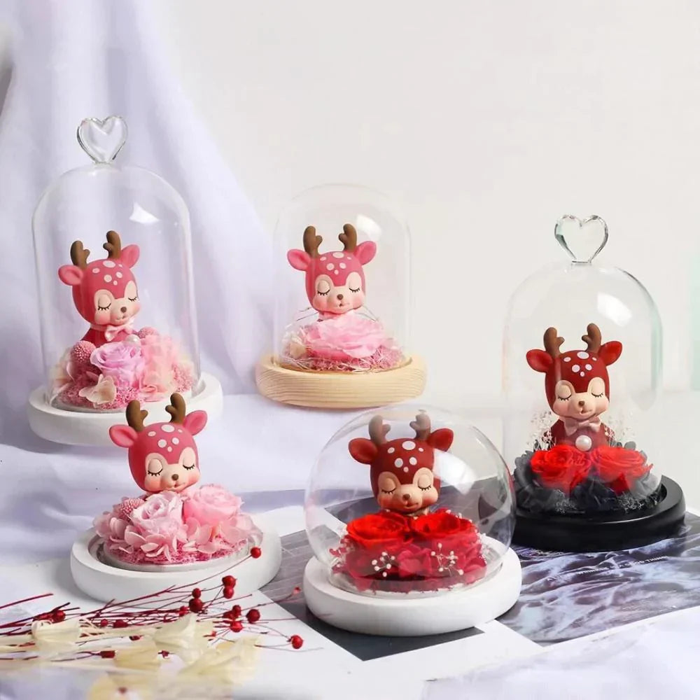 LED display featuring a preserved rose and adorable deer figurine under a glass dome.  Warm LED lights enhance the charming décor. Perfect gift!