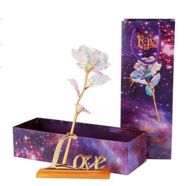 Iridescent galaxy rose in 24k gold-plated frame with "Love" stand.  Perfect gift for anniversaries & Valentine's Day.