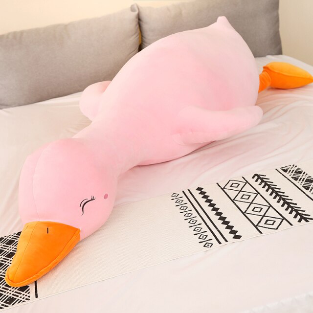 Giant pink Flora swan plush pillow; super-soft PP cotton filling; promotes relaxation;  various sizes.