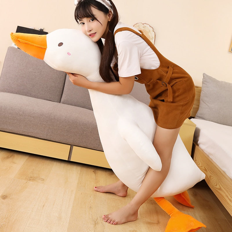Giant Flora swan plush pillow, white with orange beak, made of premium PP cotton, hypoallergenic, perfect for snuggling.