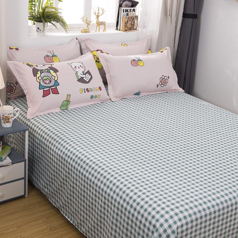 Girls' green gingham reversible bedding set; pink cartoon fishing print, includes duvet cover, flat sheet & pillowcases. 100% polyester microfiber.