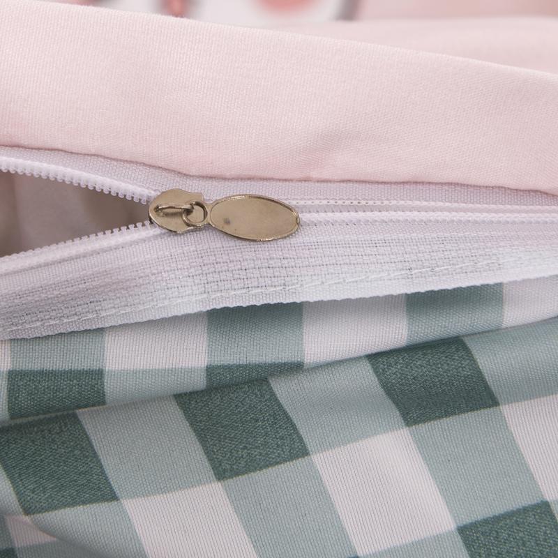 Girls' green gingham & pink reversible duvet cover set with zipper closure; includes flat sheet & pillowcase(s). 100% microfiber.