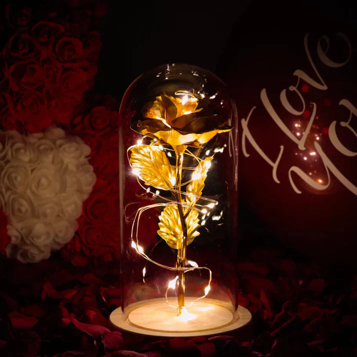 Gold LED rose in glass dome, on wooden base; 20 warm white lights; perfect gift.