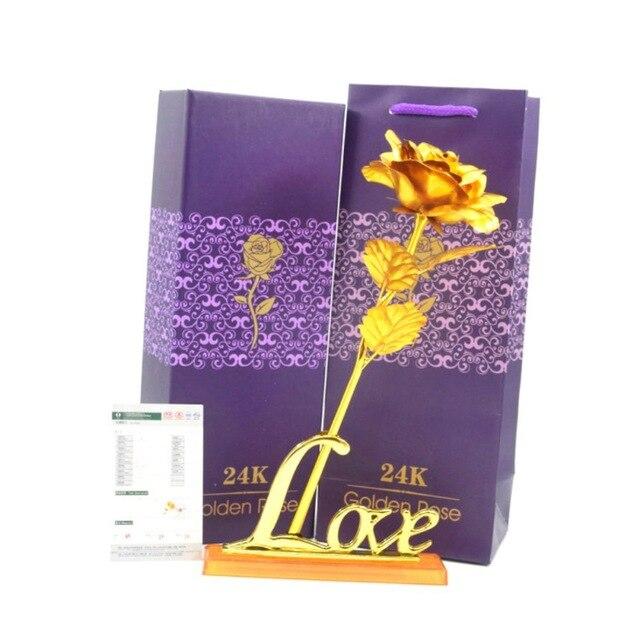 24k gold-plated galaxy rose in heart-shaped stand, with "Love" inscription.  Iridescent finish, gift box included.